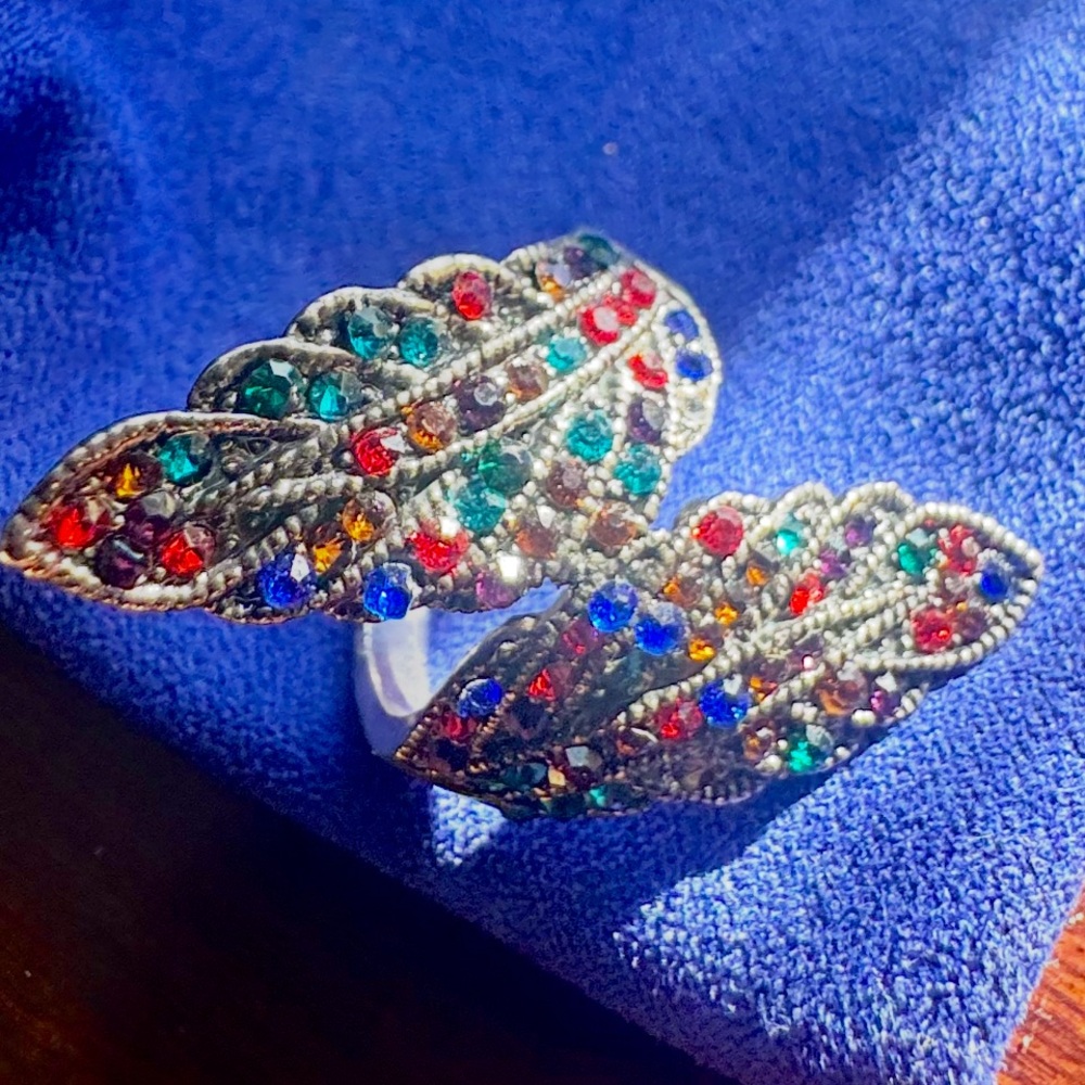 Womens antique silver ring with colored stones.